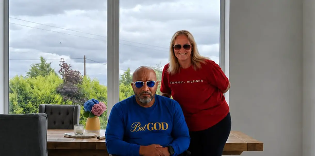 A picture of a a man in his wheelchair pictured at this home with his PA
