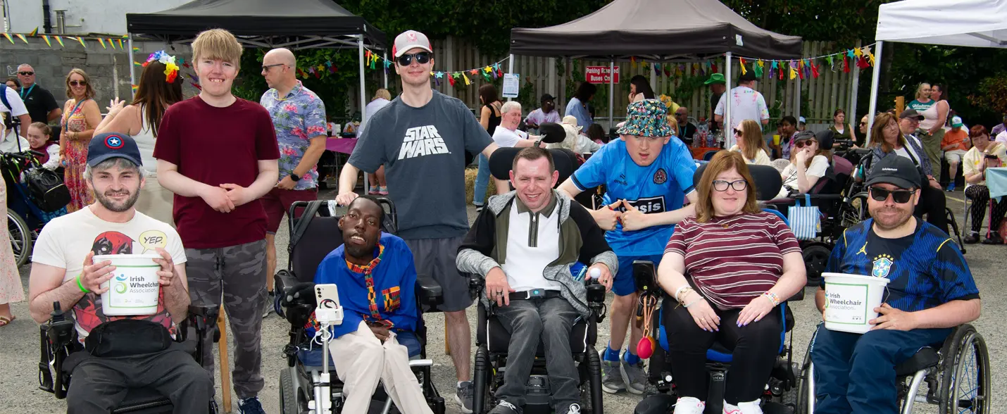 Members of Irish Wheelchair Association holding collection buckets in advance of Annual Fundraising Day.